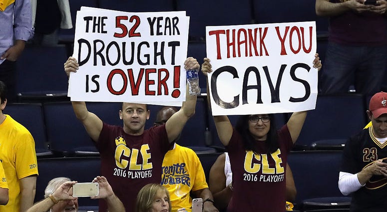 OAKLAND, CA - JUNE 19: Cleveland Cavaliers fans hold signs after the Cavaliers defeated the Golden State Warriors 93-89 in Game 7 of the 2016 NBA Finals at ORACLE Arena on June 19, 2016 in Oakland, California. NOTE TO USER: User expressly acknowledges and OAKLAND, CA - JUNE 19: Cleveland Cavaliers fans hold signs after the Cavaliers defeated the Golden State Warriors 93-89 in Game 7 of the 2016 NBA Finals at ORACLE Arena on June 19, 2016 in Oakland, California. NOTE TO USER: User expressly acknowledges and