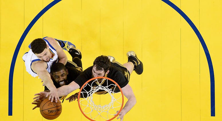 OAKLAND, CA - JUNE 19: Kyrie Irving #2 and Kevin Love #0 of the Cleveland Cavaliers go after the ball in front of Klay Thompson #11 of the Golden State Warriors in the second half in Game 7 of the 2016 NBA Finals at ORACLE Arena on June 19, 2016 in Oaklan OAKLAND, CA - JUNE 19: Kyrie Irving #2 and Kevin Love #0 of the Cleveland Cavaliers go after the ball in front of Klay Thompson #11 of the Golden State Warriors in the second half in Game 7 of the 2016 NBA Finals at ORACLE Arena on June 19, 2016 in Oaklan