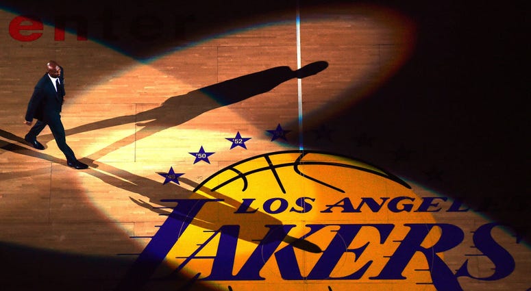LOS ANGELES, CA - DECEMBER 18: Kobe Bryant walk out to center court during his jersey retirement ceremony at halftime of a basketball game between the Los Angeles Lakers and the Golden State Warriors at Staples Center on December 18, 2017 in Los Angeles, LOS ANGELES, CA - DECEMBER 18: Kobe Bryant walk out to center court during his jersey retirement ceremony at halftime of a basketball game between the Los Angeles Lakers and the Golden State Warriors at Staples Center on December 18, 2017 in Los Angeles,