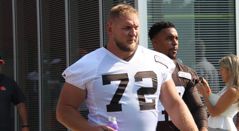 Cleveland Browns starting RG Eric Kush enters the practice field on the first day of training camp in July Cleveland Browns starting right guard Eric Kush enters the practice field on the first day of training camp in July