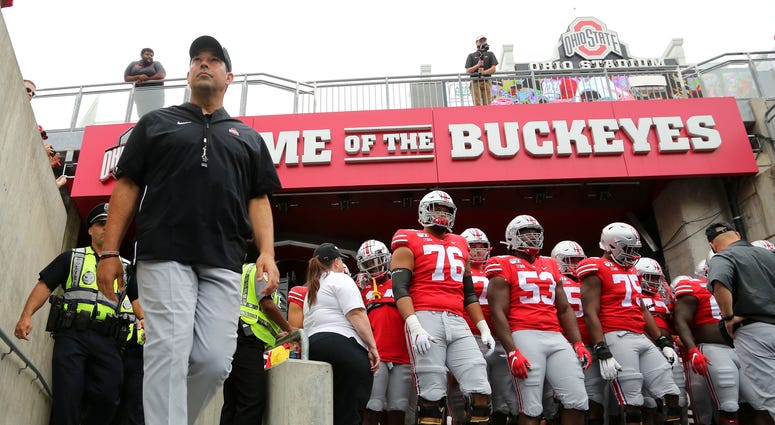 Aug 31, 2019; Columbus, OH, USA; Ohio State Buckeyes head coach Ryan Day walks to the field with his team before the game against the Florida Atlantic Owls at Ohio Stadium. Ohio State Buckeyes head coach Ryan Day walks to the field with his team before the game against the Florida Atlantic Owls at Ohio Stadium