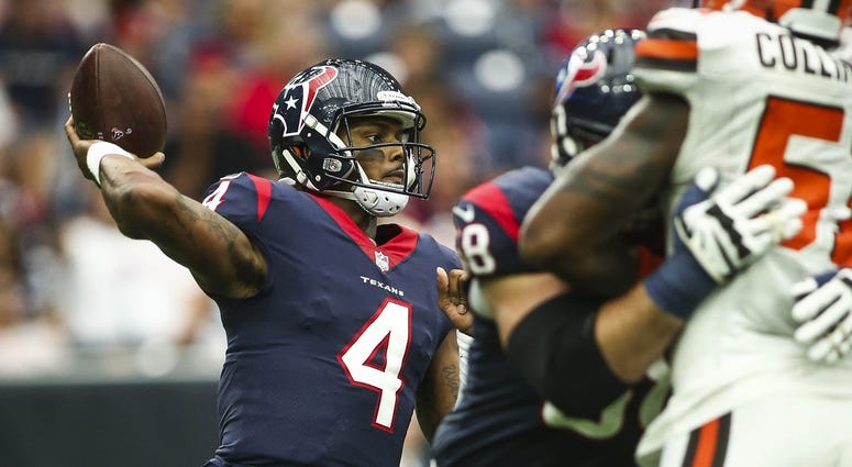 Houston Texans quarterback Deshaun Watson (4) attempts a pass during the fourth quarter against the Cleveland Browns at NRG Stadium.