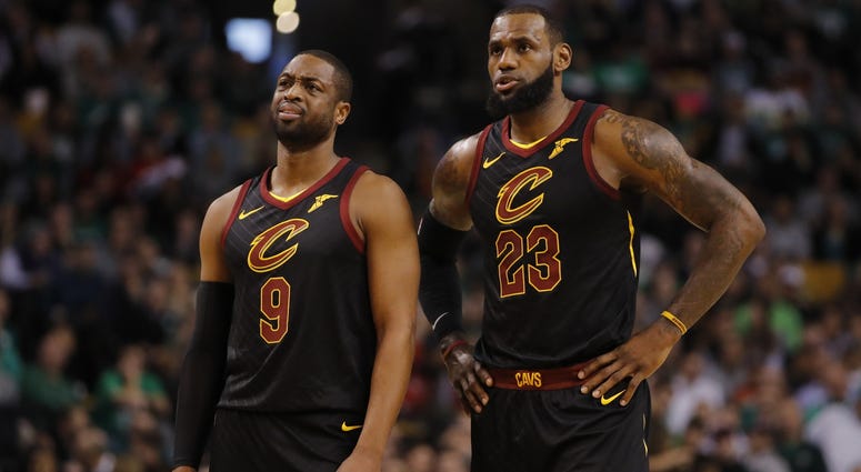 Jan 3, 2018; Boston, MA, USA; Cleveland Cavaliers guard Dwyane Wade (9) and forward LeBron James (23) talk on the court against the Boston Celtics in the first quarter at TD Garden. Mandatory Credit: David Butler II-USA TODAY Sports Jan 3, 2018; Boston, MA, USA; Cleveland Cavaliers guard Dwyane Wade (9) and forward LeBron James (23) talk on the court against the Boston Celtics in the first quarter at TD Garden. Mandatory Credit: David Butler II-USA TODAY Sports