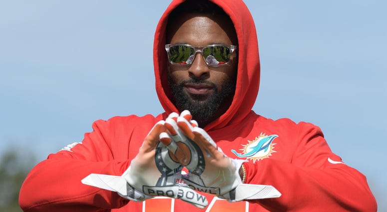 Receiver Jarvis Landry (14) poses with Pro Bowl logo gloves during AFC practice for the 2018 Pro Bowl Receiver Jarvis Landry (14) poses with Pro Bowl logo gloves during AFC practice for the 2018 Pro Bowl