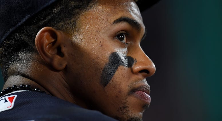 Apr 2, 2018; Anaheim, CA, USA; Cleveland Indians shortstop Francisco Lindor (12) looks on from the dugout during the game against the Los Angeles Angels at Angel Stadium of Anaheim. Apr 2, 2018; Anaheim, CA, USA; Cleveland Indians shortstop Francisco Lindor (12) looks on from the dugout during the game against the Los Angeles Angels at Angel Stadium of Anaheim.