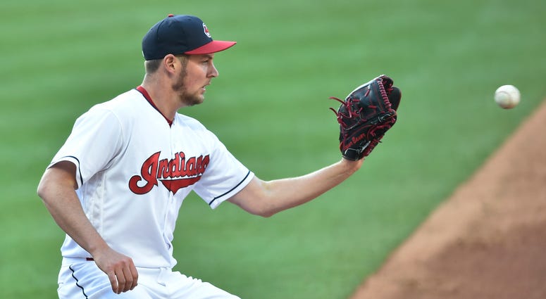 Apr 30, 2018; Cleveland, OH, USA; Cleveland Indians starting pitcher Trevor Bauer (47) makes a put out at first base in the third inning against the Texas Rangers at Progressive Field. Apr 30, 2018; Cleveland, OH, USA; Cleveland Indians starting pitcher Trevor Bauer (47) makes a put out at first base in the third inning against the Texas Rangers at Progressive Field.