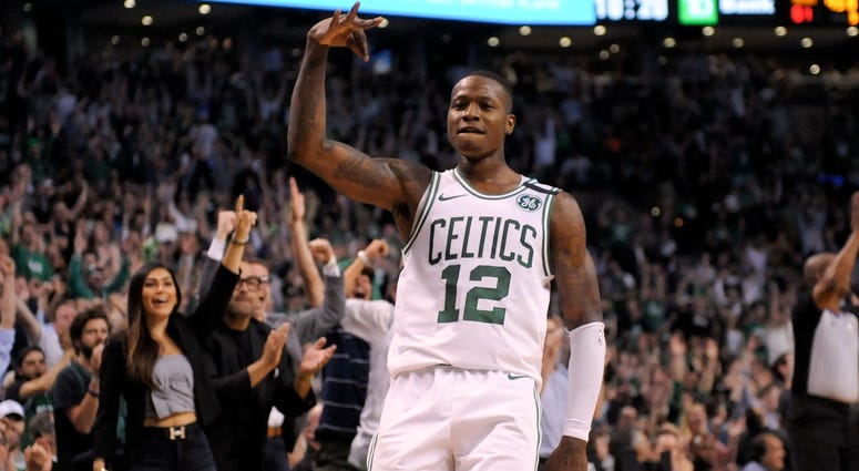 Celtics guard Terry Rozier (12) reacts after scoring against the Cleveland Cavaliers during the third quarter in game two of the Eastern conference finals of the 2018 NBA Playoffs at TD Garden. Celtics guard Terry Rozier (12) reacts after scoring against the Cleveland Cavaliers during the third quarter in game two of the Eastern conference finals of the 2018 NBA Playoffs at TD Garden.