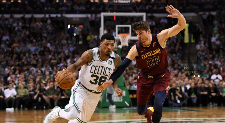 May 15, 2018; Boston, MA, USA; Boston Celtics guard Marcus Smart (36) drives against Cleveland Cavaliers guard Kyle Korver (26) during the third quarter in game two of the Eastern conference finals of the 2018 NBA Playoffs at TD Garden. May 15, 2018; Boston, MA, USA; Boston Celtics guard Marcus Smart (36) drives against Cleveland Cavaliers guard Kyle Korver (26) during the third quarter in game two of the Eastern conference finals of the 2018 NBA Playoffs at TD Garden.