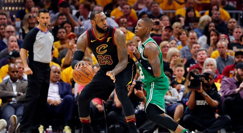 May 19, 2018; Cleveland, OH, USA; Cleveland Cavaliers forward LeBron James (23) drives against Boston Celtics guard Terry Rozier (12) in game three of the Eastern conference finals of the 2018 NBA Playoffs at Quicken Loans Arena. May 19, 2018; Cleveland, OH, USA; Cleveland Cavaliers forward LeBron James (23) drives against Boston Celtics guard Terry Rozier (12) in game three of the Eastern conference finals of the 2018 NBA Playoffs at Quicken Loans Arena.