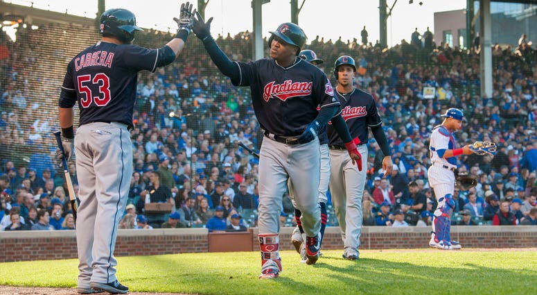 May 22, 2018; Chicago, IL, USA; Cleveland Indians third baseman Jose Ramirez (11) celebrates his three run home run with right fielder Melky Cabrera (53) during the third inning against the Chicago Cubs at Wrigley Field. May 22, 2018; Chicago, IL, USA; Cleveland Indians third baseman Jose Ramirez (11) celebrates his three run home run with right fielder Melky Cabrera (53) during the third inning against the Chicago Cubs at Wrigley Field.