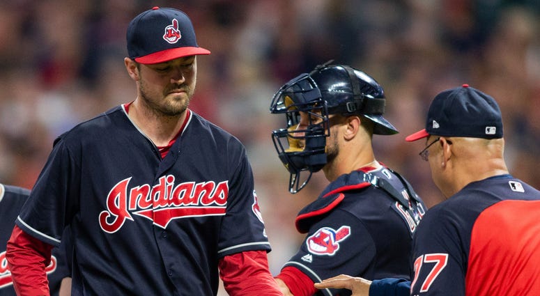 May 25, 2018; Cleveland, OH, USA; Cleveland Indians pitcher Andrew Miller, (left), gives the ball to Cleveland Indians manager Terry Francona after giving up a two run hit to the Houston Astros during the eighth inning at Progressive Field. May 25, 2018; Cleveland, OH, USA; Cleveland Indians pitcher Andrew Miller, (left), gives the ball to Cleveland Indians manager Terry Francona after giving up a two run hit to the Houston Astros during the eighth inning at Progressive Field.