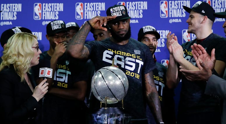 May 27, 2018; Boston, MA, USA; Cleveland Cavaliers forward LeBron James solutes in front of the Eastern Conference trophy after defeating the Boston Celtics in the 2018 NBA Playoffs at TD Garden. Mandatory Credit: David Butler II-USA TODAY Sports May 27, 2018; Boston, MA, USA; Cleveland Cavaliers forward LeBron James solutes in front of the Eastern Conference trophy after defeating the Boston Celtics in the 2018 NBA Playoffs at TD Garden. Mandatory Credit: David Butler II-USA TODAY Sports