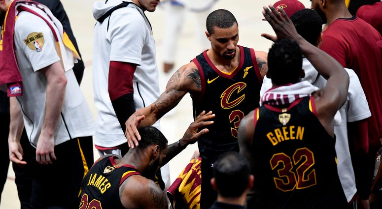 Jun 8, 2018; Cleveland, OH, USA; Cleveland Cavaliers forward LeBron James (23) reacts with guard George Hill (3) at the bench after leaving the game during the fourth quarter in game four of the 2018 NBA Finals Golden State Warriors at Quicken Loans Arena Jun 8, 2018; Cleveland, OH, USA; Cleveland Cavaliers forward LeBron James (23) reacts with guard George Hill (3) at the bench after leaving the game during the fourth quarter in game four of the 2018 NBA Finals Golden State Warriors at Quicken Loans Arena