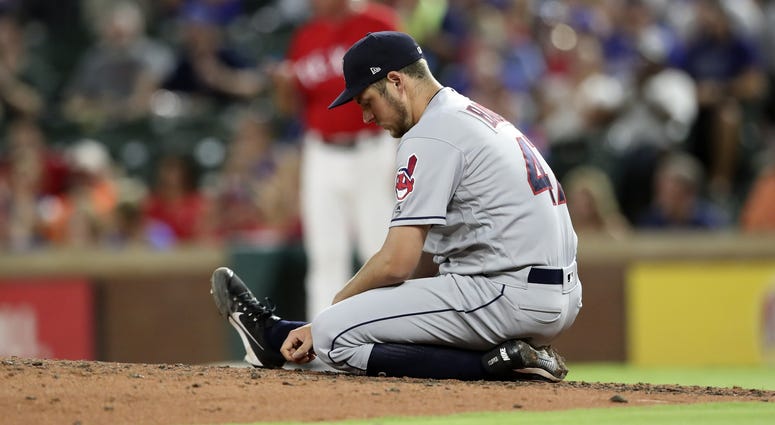 Jul 20, 2018; Arlington, TX, USA; Cleveland Indians starting pitcher Trevor Bauer (47) reacts during the fifth inning against the Texas Rangers at Globe Life Park in Arlington. Jul 20, 2018; Arlington, TX, USA; Cleveland Indians starting pitcher Trevor Bauer (47) reacts during the fifth inning against the Texas Rangers at Globe Life Park in Arlington.