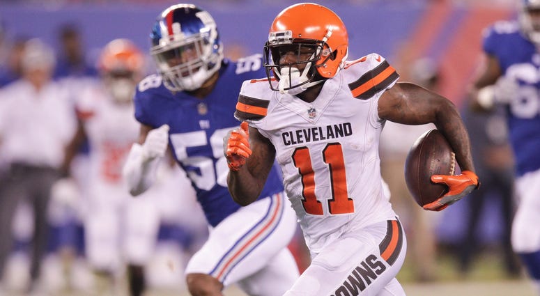 Cleveland Browns wide receiver Antonio Callaway (11) runs for a touchdown after a catch against New York Giants linebacker Tae Davis (58) during the second half at MetLife Stadium. Cleveland Browns wide receiver Antonio Callaway (11) runs for a touchdown after a catch against New York Giants linebacker Tae Davis (58) during the second half at MetLife Stadium.