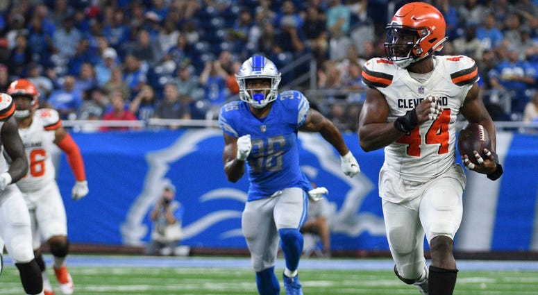 Cleveland Browns defensive end Nate Orchard (44) runs for a touchdown after making an interception during the second quarter against the Detroit Lions at Ford Field Cleveland Browns defensive end Nate Orchard (44) runs for a touchdown after making an interception during the second quarter against the Detroit Lions at Ford Field