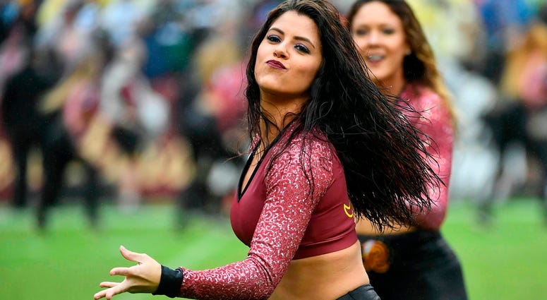 Sep 23, 2018; Landover, MD, USA; Washington Redskins cheerleader on the field against the Green Bay Packers during the second half at FedEx Field. Mandatory Credit: Brad Mills-USA TODAY Sports Sep 23, 2018; Landover, MD, USA; Washington Redskins cheerleader on the field against the Green Bay Packers during the second half at FedEx Field. Mandatory Credit: Brad Mills-USA TODAY Sports