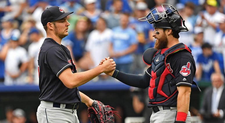 Sep 30, 2018; Kansas City, MO, USA; Cleveland Indians starting pitcher Trevor Bauer (47) shakes hands with catcher Eric Haase (38) after beating the Kansas City Royals at Kauffman Stadium. Sep 30, 2018; Kansas City, MO, USA; Cleveland Indians starting pitcher Trevor Bauer (47) shakes hands with catcher Eric Haase (38) after beating the Kansas City Royals at Kauffman Stadium.