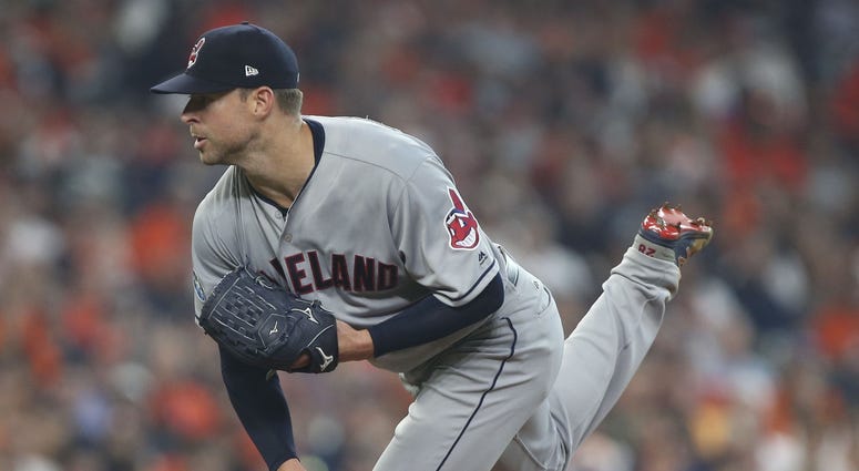 Cleveland Indians starting pitcher Corey Kluber (28) delivers a pitch during the first inning in game one of the 2018 ALDS playoff baseball series against the Houston Astros at Minute Maid Park. Corey Kluber Game 1 ALDS