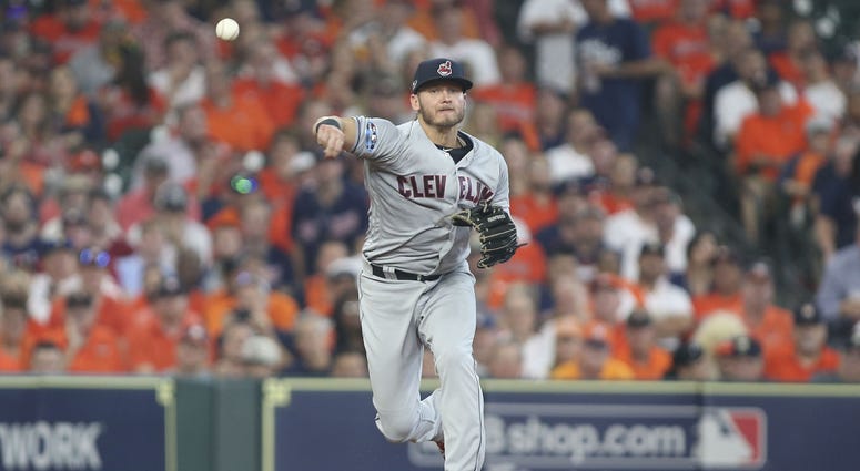 Cleveland Indians third baseman Josh Donaldson (27) throws out Houston Astros center fielder George Springer (not pictured) on a ground ball during the third inning in game one of the 2018 ALDS Josh Donaldson Game 1 ALDS