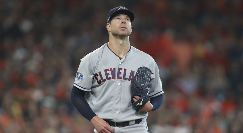 Cleveland Indians starting pitcher Corey Kluber (28) looks at a single by Houston Astros left fielder Marwin Gonzalez (not pictured) during the fifth inning in game one of the 2018 ALDS Corey Kluber Game 1 ALDS
