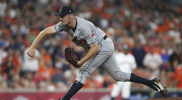Cleveland Indians pitcher Trevor Bauer (47) delivers a pitch during the seventh inning in game one of the 2018 ALDS playoff baseball series against the Houston Astros at Minute Maid Park. Trevor Bauer Game 1 ALDS