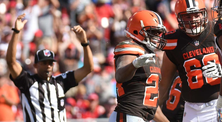 Cleveland Browns running back Nick Chubb (24) celebrates after scoring a touchdown in the second half against the Tampa Bay Buccaneers at Raymond James Stadium. Nick Chubb Cleveland Browns score touchdown against Tampa Bay Buccaneers