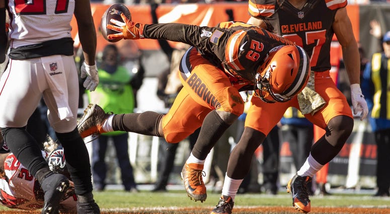 Cleveland Browns running back Duke Johnson (29) falls as he enters the end zone for a touchdown against the Atlanta Falcons during the fourth quarter at FirstEnergy Stadium. Duke Johnson scores a touchdown against the Atlanta Falcons