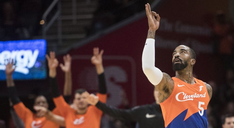 Cleveland Cavaliers guard JR Smith (5) celebrates a three-pointer during the second half against the Charlotte Hornets at Quicken Loans Arena Cleveland Cavaliers guard JR Smith (5) celebrates a three-pointer during the second half against the Charlotte Hornets at Quicken Loans Arena