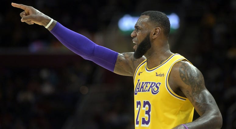 Los Angeles Lakers forward LeBron James (23) reacts in the second quarter against the Cleveland Cavaliers at Quicken Loans Arena.