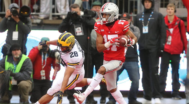 Ohio State Buckeyes wide receiver Chris Olave (17) catches a second quarter touchdown against the Michigan Wolverines at Ohio Stadium. Chris Olave Ohio State