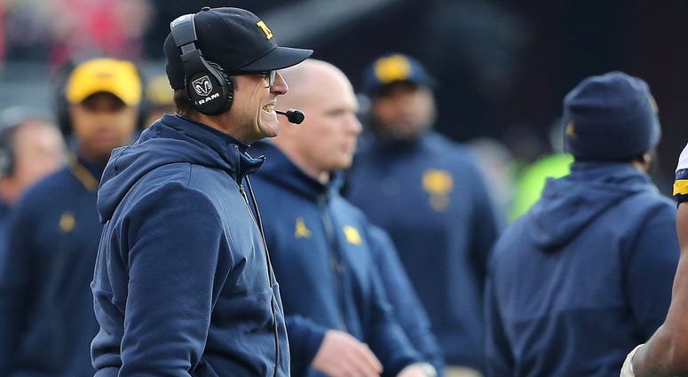 Michigan Wolverines head coach Jim Harbaugh reacts as time winds down against the Ohio State Buckeyes at Ohio Stadium. Jim Harbaugh