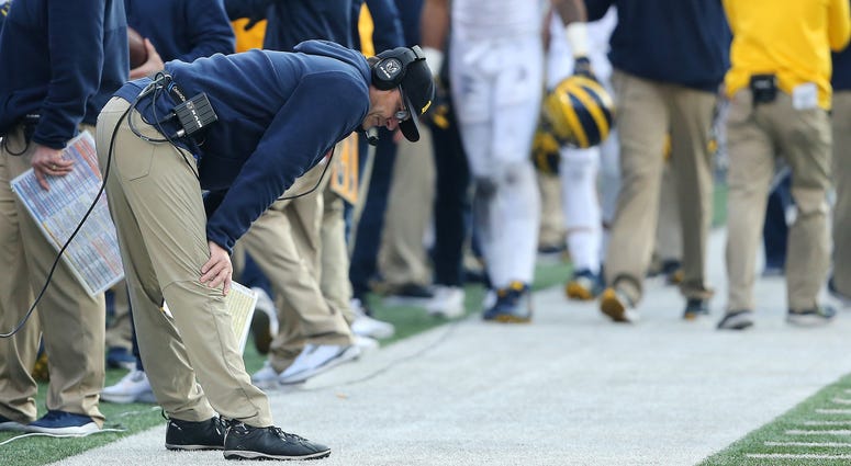 Michigan Wolverines head coach Jim Harbaugh reacts as time winds down against the Ohio State Buckeyes at Ohio Stadium. Jim Harbaugh