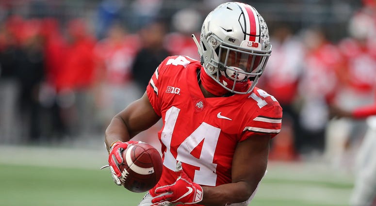 Ohio State Buckeyes wide receiver K.J. Hill (14) catches a pass for a touchdown against the Michigan Wolverines at Ohio Stadium K.J. Hill Ohio State