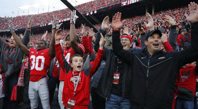 Ohio State Buckeyes assistant coach Ryan Day (right) celebrates following a Buckeyes win against the Michigan Wolverines at Ohio Stadium. Ryan Day Ohio State