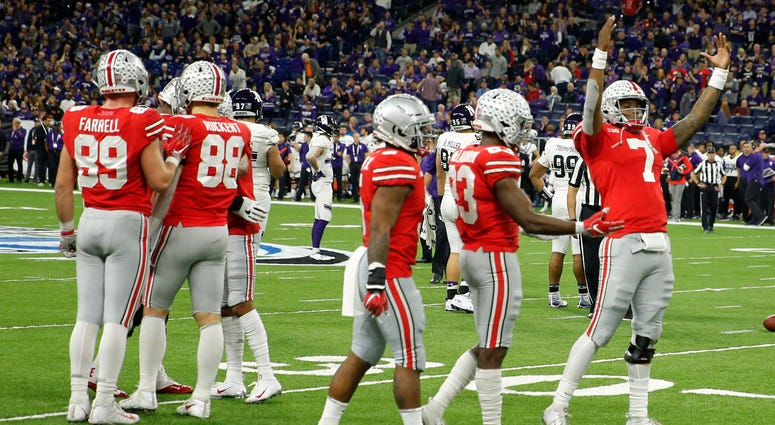 Ohio State Buckeyes quarterback Dwayne Haskins Jr. (7) celebrates in the closing seconds against the Northwestern Wildcats during the fourth quarter in the Big Ten conference championship game at Lucas Oil Stadium. Ohio State Buckeyes quarterback Dwayne Haskins Jr. (7) celebrates in the closing seconds against the Northwestern Wildcats during the fourth quarter in the Big Ten conference championship game at Lucas Oil Stadium.