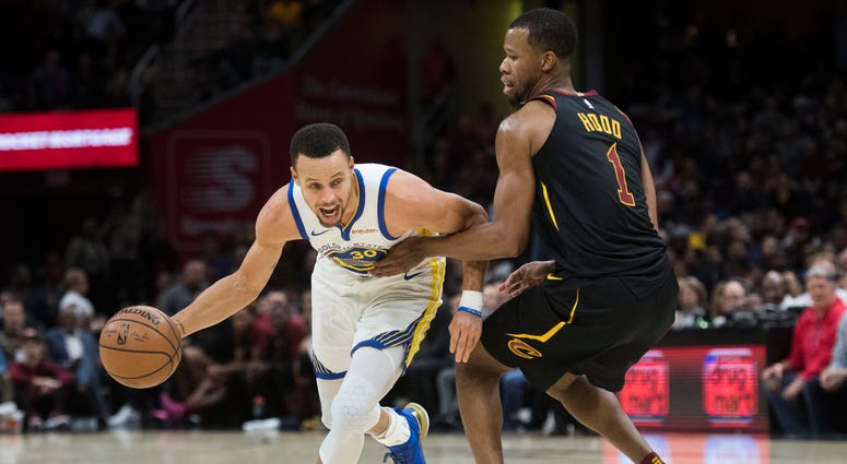 Dec 5, 2018; Cleveland, OH, USA; Golden State Warriors guard Stephen Curry (30) drives to the basket against Cleveland Cavaliers guard Rodney Hood (1) during the first half at Quicken Loans Arena. Mandatory Credit: Ken Blaze-USA TODAY Sports Dec 5, 2018; Cleveland, OH, USA; Golden State Warriors guard Stephen Curry (30) drives to the basket against Cleveland Cavaliers guard Rodney Hood (1) during the first half at Quicken Loans Arena. Mandatory Credit: Ken Blaze-USA TODAY Sports