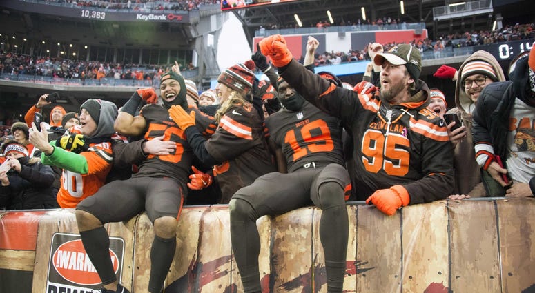 Dec 23, 2018; Cleveland, OH, USA; Cleveland Browns linebacker Xavier Woodson-Luster (56) and wide receiver Breshad Perriman (19) celebrate with fans after the Browns beat the Cincinnati Bengals at FirstEnergy Stadium. Mandatory Credit: Ken Blaze-USA TODAY Dec 23, 2018; Cleveland, OH, USA; Cleveland Browns linebacker Xavier Woodson-Luster (56) and wide receiver Breshad Perriman (19) celebrate with fans after the Browns beat the Cincinnati Bengals at FirstEnergy Stadium. Mandatory Credit: Ken Blaze-USA TODAY