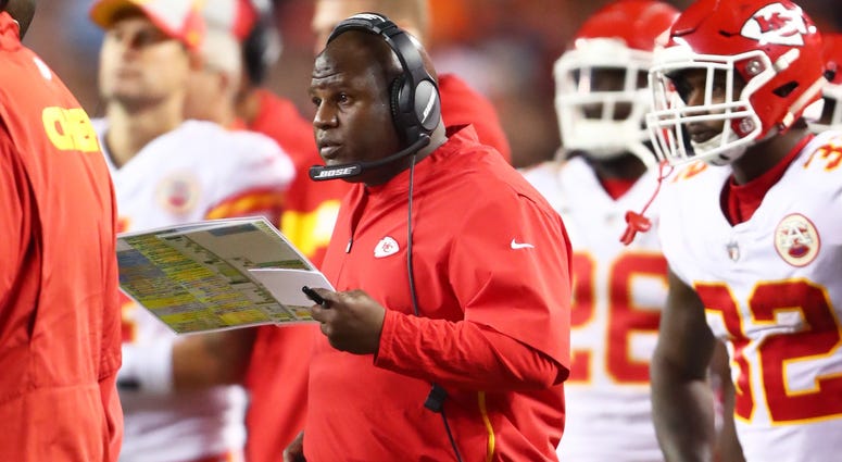 Kansas City Chiefs offensive coordinator Eric Bieniemy against the Denver Broncos at Broncos Stadium at Mile High. Kansas City Chiefs offensive coordinator Eric Bieniemy