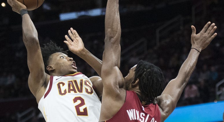 Cleveland Cavaliers guard Collin Sexton (2) shoots over the defense of Miami Heat forward Justise Winslow (20) during the second half at Quicken Loans Arena. Cleveland Cavaliers guard Collin Sexton (2) shoots over the defense of Miami Heat forward Justise Winslow (20) during the second half at Quicken Loans Arena.