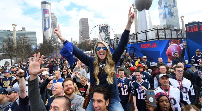 Feb 3, 2019; Atlanta, GA, USA; Fans gather outside of the stadium before Super Bowl LIII between the New England Patriots and the Los Angeles Rams at Mercedes-Benz Stadium. Mandatory Credit: Christopher Hanewinckel-USA TODAY Sports Feb 3, 2019; Atlanta, GA, USA; Fans gather outside of the stadium before Super Bowl LIII between the New England Patriots and the Los Angeles Rams at Mercedes-Benz Stadium. Mandatory Credit: Christopher Hanewinckel-USA TODAY Sports