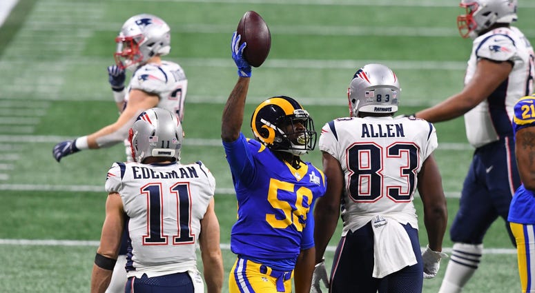 Feb 3, 2019; Atlanta, GA, USA; Los Angeles Rams inside linebacker Cory Littleton (58) reacts after intercepting a pass against the New England Patriots during the first quarter of Super Bowl LIII at Mercedes-Benz Stadium. Mandatory Credit: John David Merc Feb 3, 2019; Atlanta, GA, USA; Los Angeles Rams inside linebacker Cory Littleton (58) reacts after intercepting a pass against the New England Patriots during the first quarter of Super Bowl LIII at Mercedes-Benz Stadium. Mandatory Credit: John David Merc