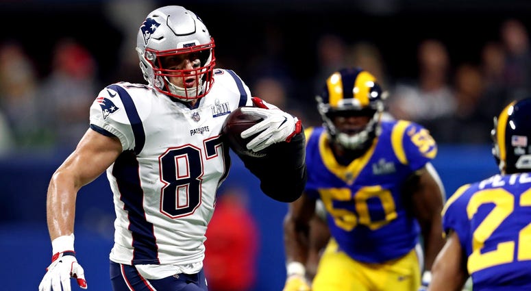Feb 3, 2019; Atlanta, GA, USA; New England Patriots tight end Rob Gronkowski (87) runs the eball against Los Angeles Rams cornerback Marcus Peters (22) during the first quarter in Super Bowl LIII at Mercedes-Benz Stadium. Mandatory Credit: Matthew Emmons- Feb 3, 2019; Atlanta, GA, USA; New England Patriots tight end Rob Gronkowski (87) runs the eball against Los Angeles Rams cornerback Marcus Peters (22) during the first quarter in Super Bowl LIII at Mercedes-Benz Stadium. Mandatory Credit: Matthew Emmons-