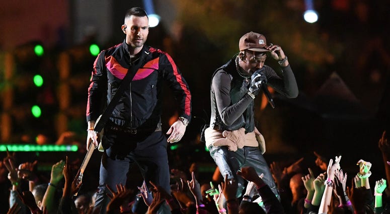 Feb 3, 2019; Atlanta, GA, USA; Maroon 5 lead singer Adam Levine and recording artist Travis Scott perform during the halftime show in Super Bowl LIII at Mercedes-Benz Stadium. Mandatory Credit: Dale Zanine-USA TODAY Sports Feb 3, 2019; Atlanta, GA, USA; Maroon 5 lead singer Adam Levine and recording artist Travis Scott perform during the halftime show in Super Bowl LIII at Mercedes-Benz Stadium. Mandatory Credit: Dale Zanine-USA TODAY Sports