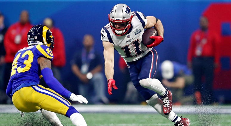 Feb 3, 2019; Atlanta, GA, USA; New England Patriots wide receiver Julian Edelman (11) runs the ball against Los Angeles Rams strong safety John Johnson (43) during the third quarter in Super Bowl LIII at Mercedes-Benz Stadium. Mandatory Credit: Matthew Em Feb 3, 2019; Atlanta, GA, USA; New England Patriots wide receiver Julian Edelman (11) runs the ball against Los Angeles Rams strong safety John Johnson (43) during the third quarter in Super Bowl LIII at Mercedes-Benz Stadium. Mandatory Credit: Matthew Em