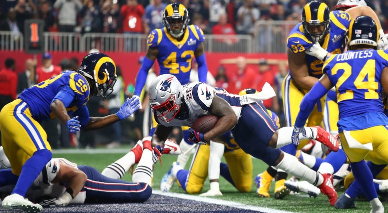 Feb 3, 2019; Atlanta, GA, USA; New England Patriots running back Sony Michel (26) scores a touchdown ahead of Los Angeles Rams inside linebacker Cory Littleton (58) in the fourth quarter in Super Bowl LIII at Mercedes-Benz Stadium. Mandatory Credit: Mark Feb 3, 2019; Atlanta, GA, USA; New England Patriots running back Sony Michel (26) scores a touchdown ahead of Los Angeles Rams inside linebacker Cory Littleton (58) in the fourth quarter in Super Bowl LIII at Mercedes-Benz Stadium. Mandatory Credit: Mark