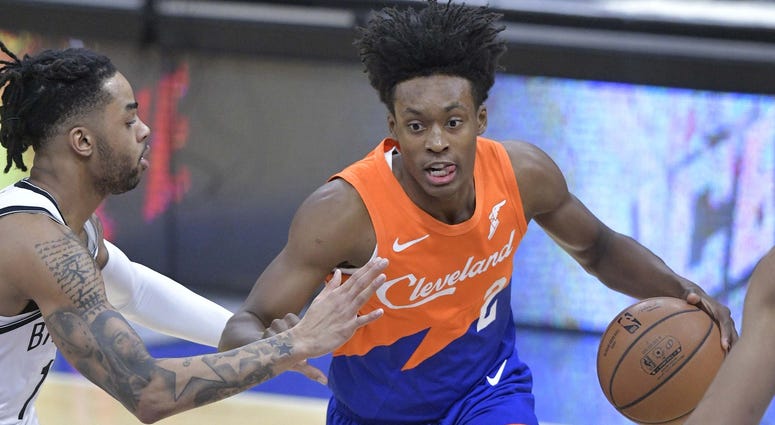 Cleveland Cavaliers guard Collin Sexton (2) drives against Brooklyn Nets guard D'Angelo Russell (1) in the first quarter at Quicken Loans Arena.