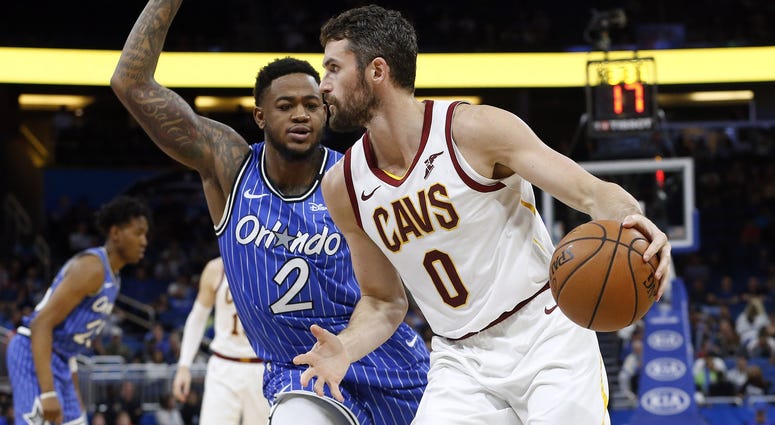 Mar 14, 2019; Orlando, FL, USA; Cleveland Cavaliers forward Kevin Love (0) drives to the basket as Orlando Magic forward Jarell Martin (2) defends during the second half at Amway Center. Mandatory Credit: Kim Klement-USA TODAY Sports Mar 14, 2019; Orlando, FL, USA; Cleveland Cavaliers forward Kevin Love (0) drives to the basket as Orlando Magic forward Jarell Martin (2) defends during the second half at Amway Center. Mandatory Credit: Kim Klement-USA TODAY Sports