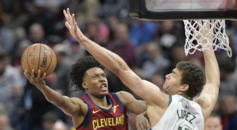 Mar 20, 2019; Cleveland, OH, USA; Cleveland Cavaliers guard Collin Sexton (2) shoots the ball around Milwaukee Bucks center Brook Lopez (11) in the first quarter at Quicken Loans Arena. Mandatory Credit: David Richard-USA TODAY Sports Mar 20, 2019; Cleveland, OH, USA; Cleveland Cavaliers guard Collin Sexton (2) shoots the ball around Milwaukee Bucks center Brook Lopez (11) in the first quarter at Quicken Loans Arena. Mandatory Credit: David Richard-USA TODAY Sports