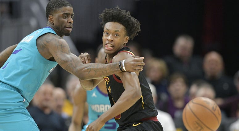 Apr 9, 2019; Cleveland, OH, USA; Cleveland Cavaliers guard Collin Sexton (2) loses the ball while defended by Charlotte Hornets guard Dwayne Bacon (7) in the second quarter at Rocket Mortgage FieldHouse